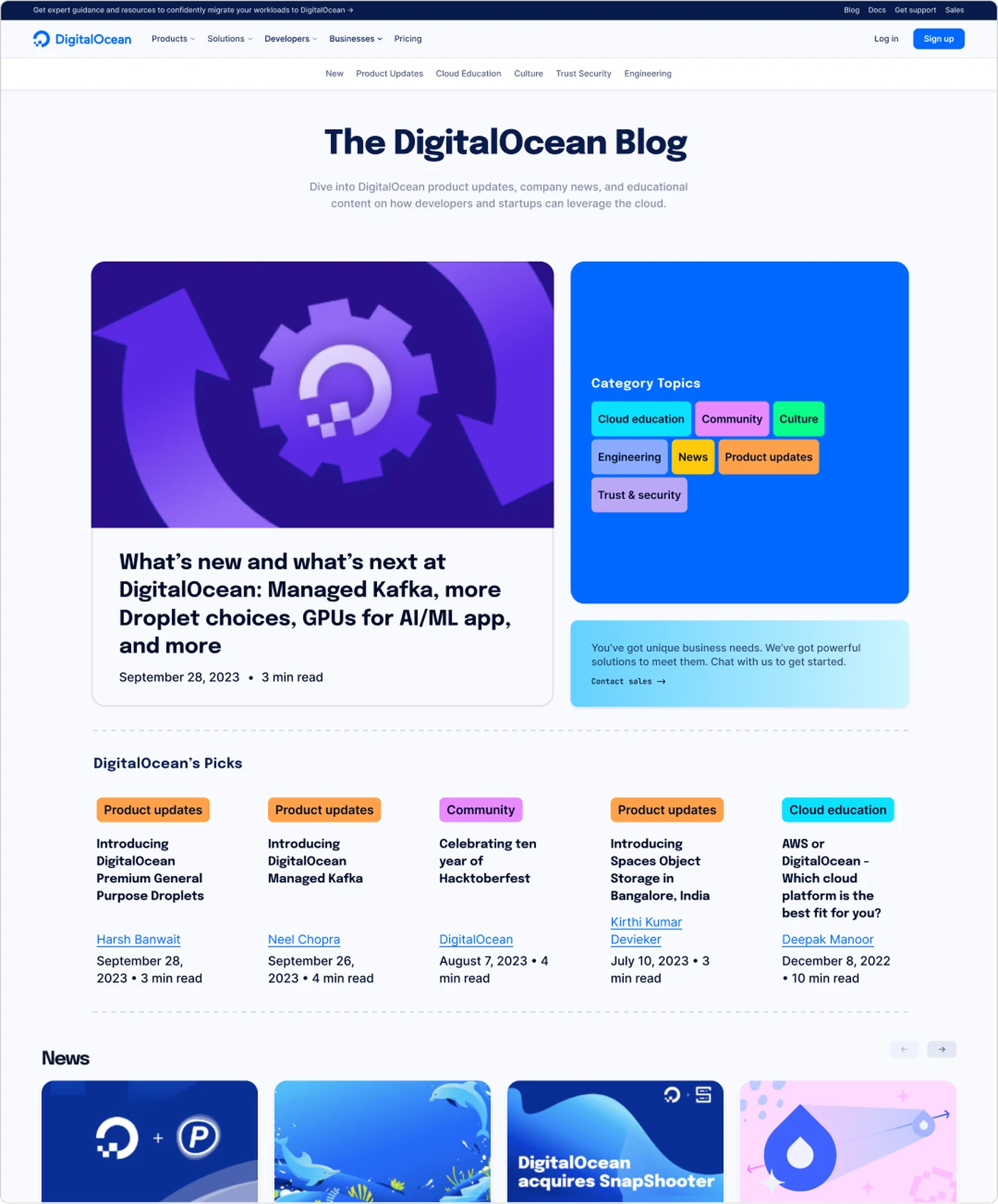 The redesigned DigitalOcean Blog: a wordmark bar, a product navigation row, a section sub-navigation, then a featured post beside a category panel and a grid of picks.